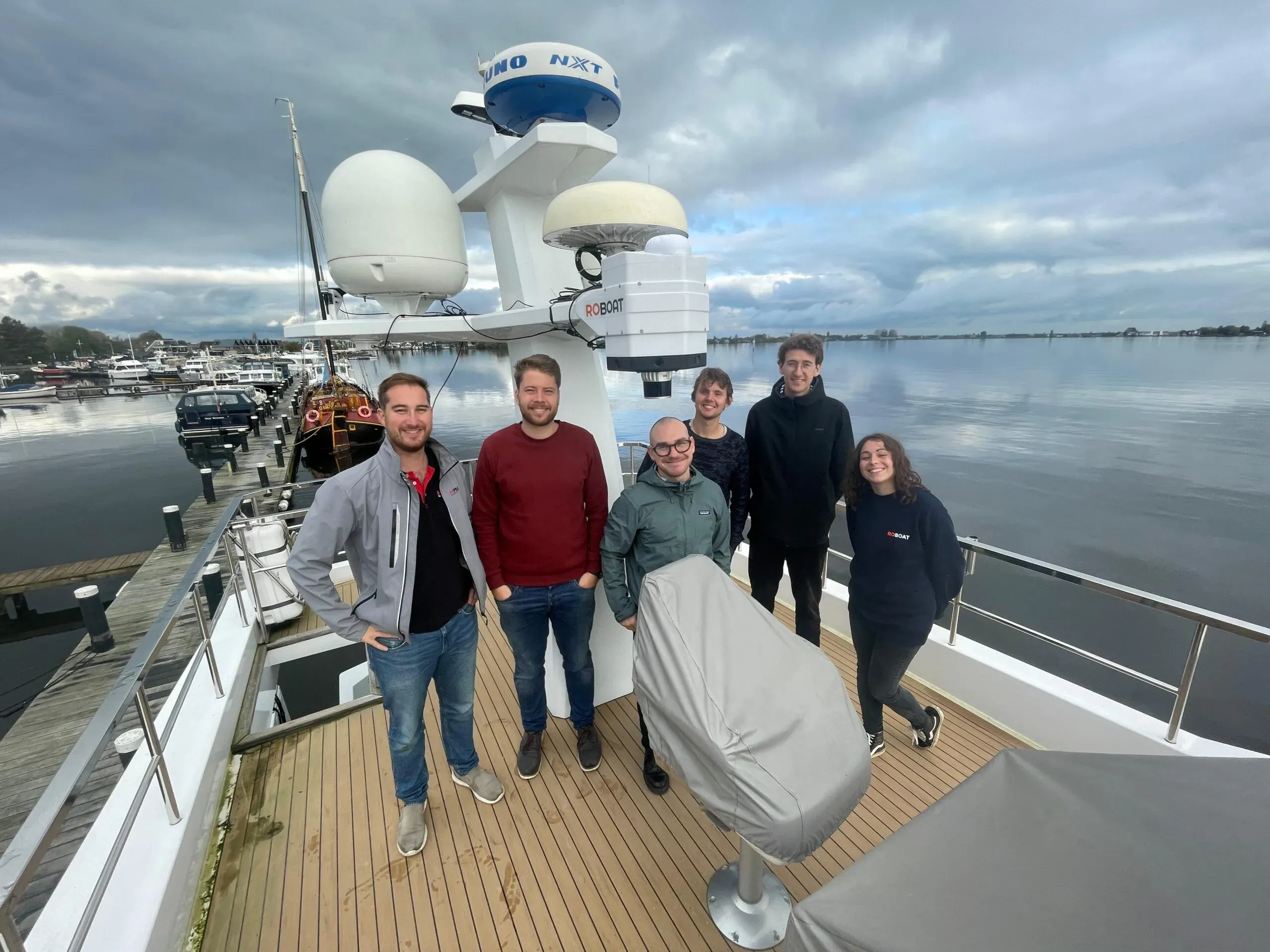 The Roboat and Praxis Automation project team aboard the vessel.