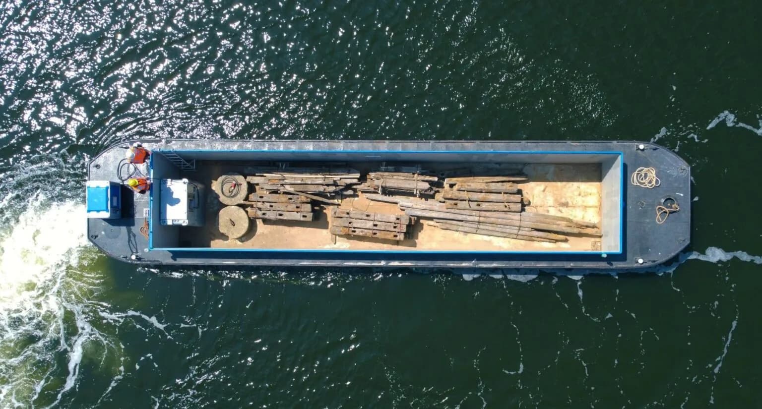 Top-down aerial of the Zoev City electric cargo barge on the water.