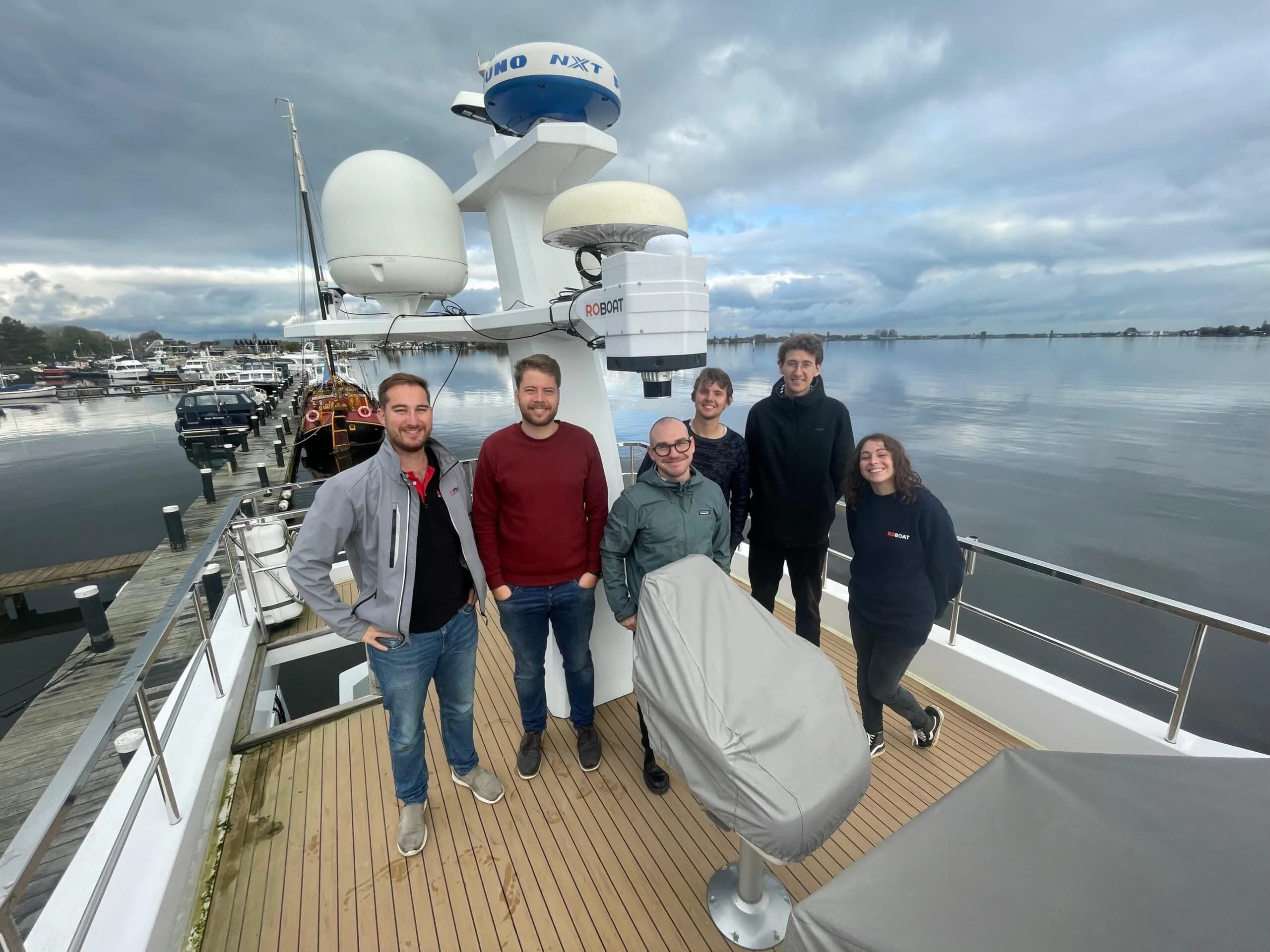 The Roboat and Praxis Automation project team aboard the vessel.